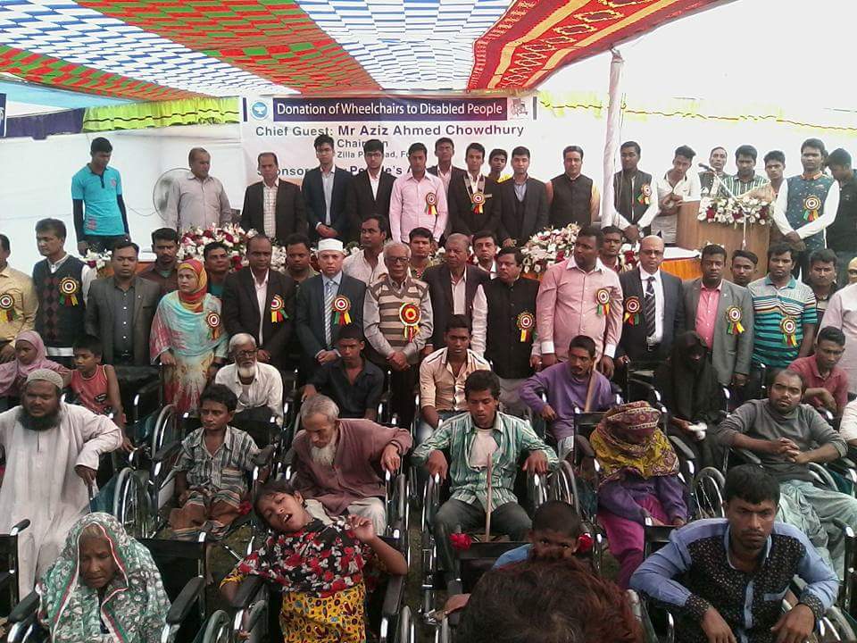সোনাগাজীতে অসহায় প্রতিবন্ধীদের মাঝে হুইলচেয়ার বিতরন